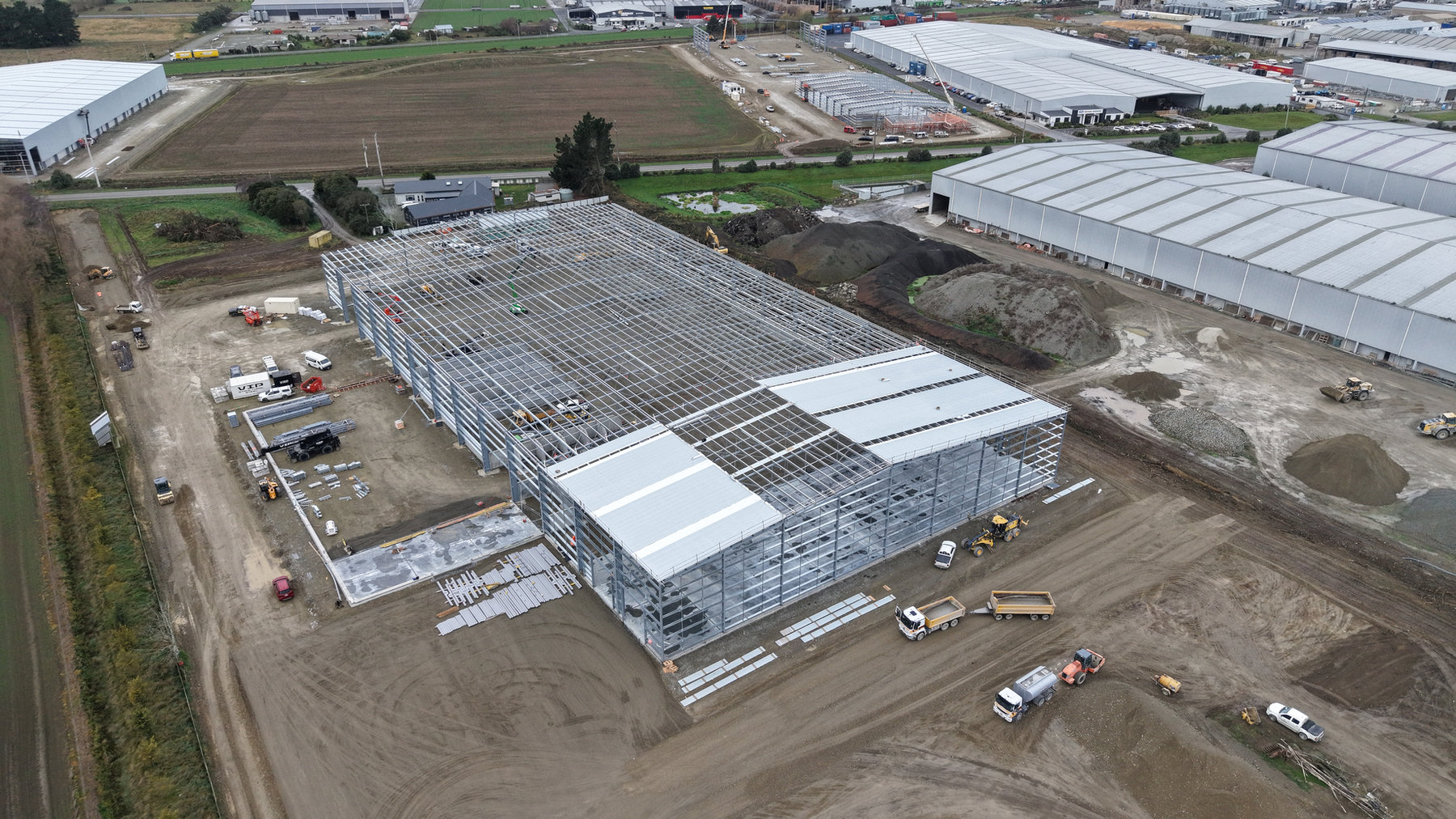 Oblique aerial photograph of a large building under construction